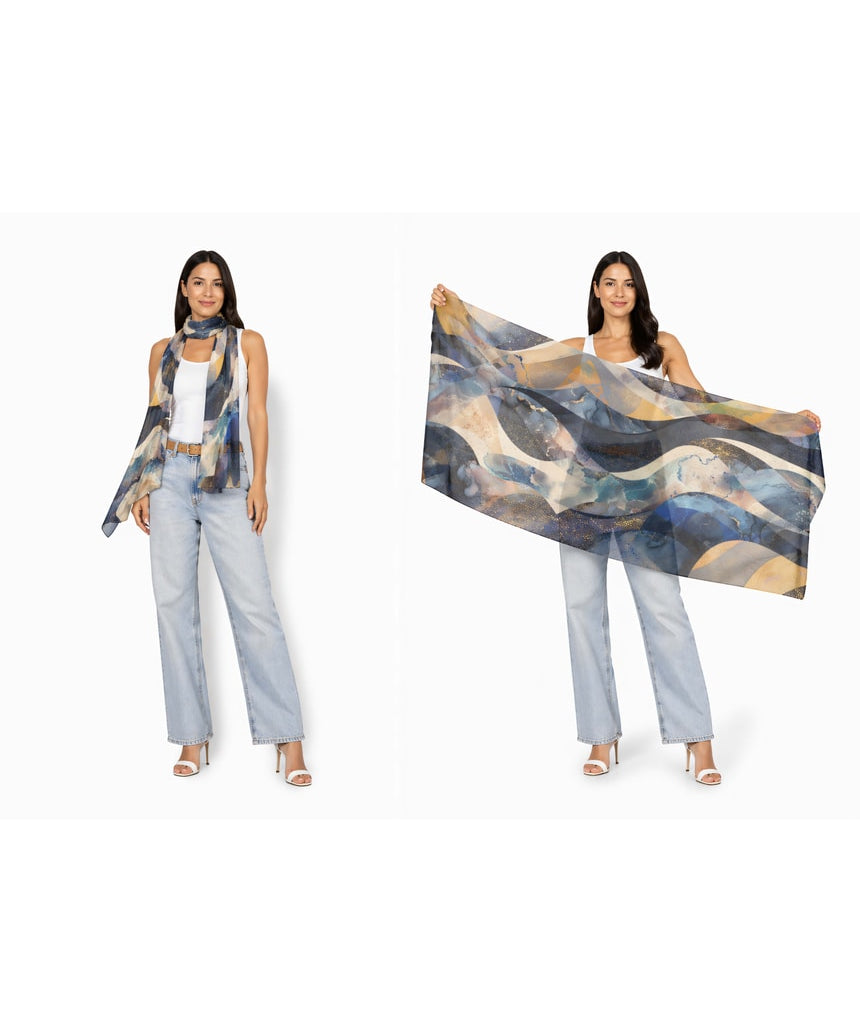 The Artists Label Celestial Waves viscose modal scarf featuring a flowing wave pattern in soft, elegant fabric.