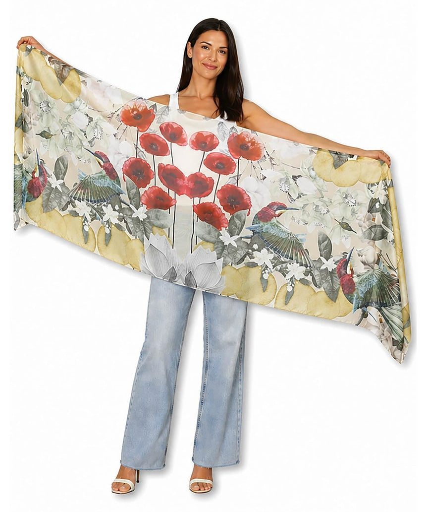 The Artists Label Jardin D’Orange viscose modal scarf with vibrant orange and floral patterns, lightweight and soft fabric.