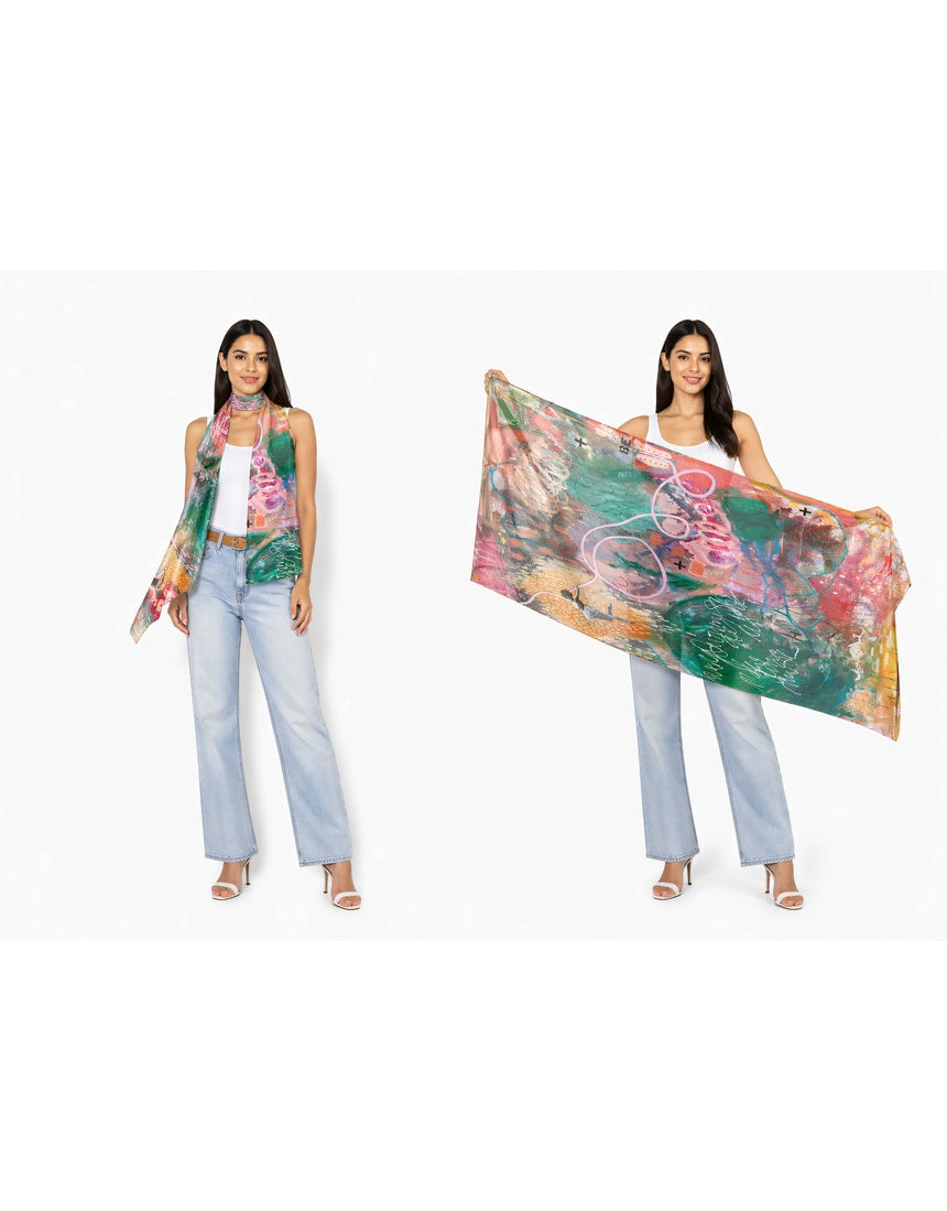 Colorful viscose modal scarf from The Artists Label with a vibrant "Your Magic Eyes" design, featuring intricate patterns and soft fabric.