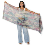 Silk chiffon scarf by The Artists Label featuring a delicate wandering through petals floral pattern in soft colors.