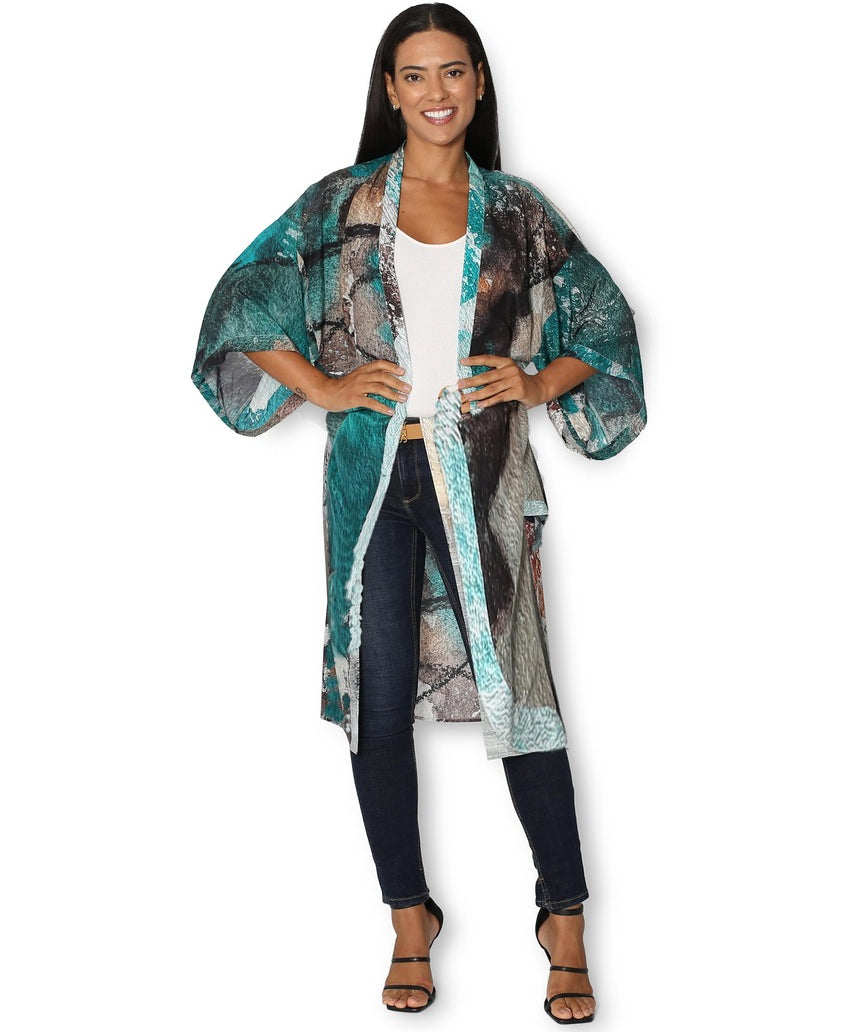 Front view of The Artists Label Winter Dance long silk kimono with intricate patterns and elegant drape, showcasing luxurious silk fabric.