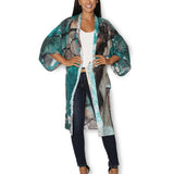 Front view of The Artists Label Winter Dance long silk kimono with intricate patterns and elegant drape, showcasing luxurious silk fabric.