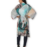 Back view of The Artists Label Winter Dance long silk kimono with intricate patterns and flowing fabric in a luxurious design.