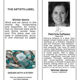The Artists Label Winter Dance Scarf displayed hanging with a visible hangtag, showcasing soft fabric and stylish design.