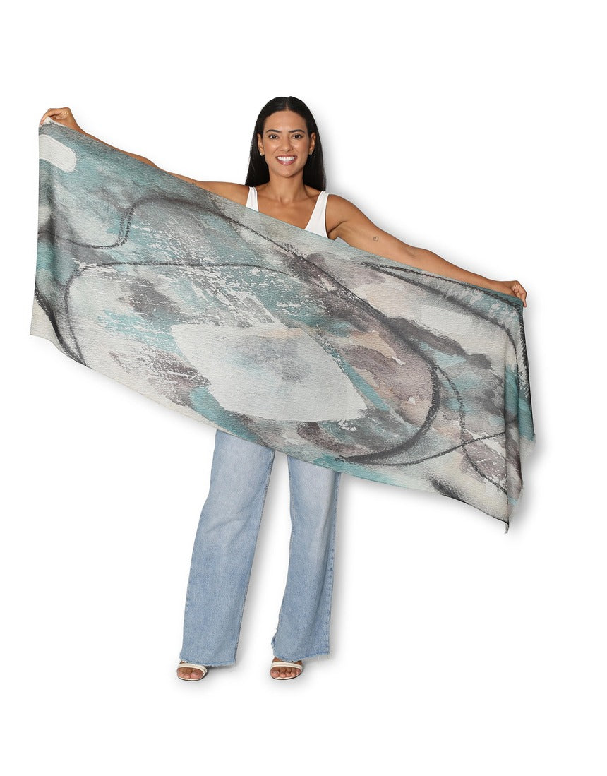 The Artists Label Winter Dance Wool Scarf displayed flat, showcasing soft, cozy wool fabric in a stylish, versatile design.