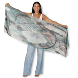 The Artists Label Winter Dance Wool Scarf displayed flat, showcasing soft, cozy wool fabric in a stylish, versatile design.
