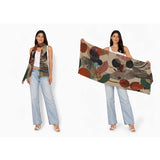 The Artists Label Atelier Wool Scarf featuring soft, woven fabric in neutral tones, draped to showcase its cozy, stylish design.