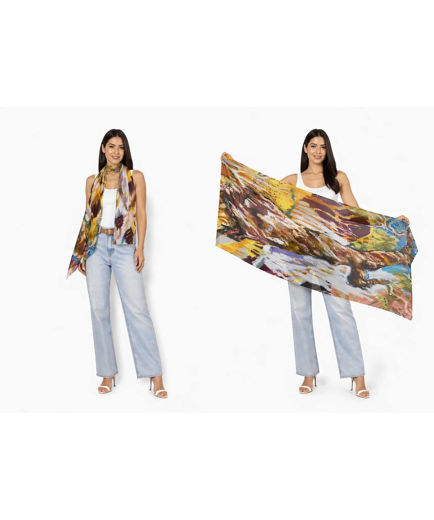 The Artists Label The Source wool scarf featuring soft, warm fabric with a stylish design in neutral tones.
