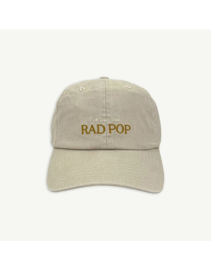 Banabae Rad Pop baseball cap in stone color, featuring a classic curved brim and adjustable strap, casual streetwear style.