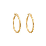 Gold vermeil hoop earrings by Linda Tahija with a sleek tube design, elegant and lightweight for everyday wear.
