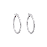 Linda Tahija sterling silver hoop earrings featuring a sleek, tube-shaped design for a modern, elegant look.