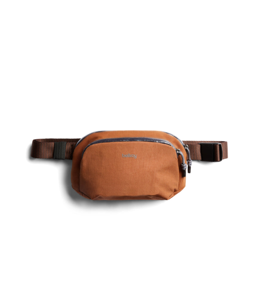 Bellroy Venture Hip Pack in bronze, compact and durable travel bag with adjustable strap and multiple compartments.