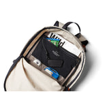 Bellroy Lite Daypack in Ash color showing its compact design with multiple compartments and adjustable straps.
