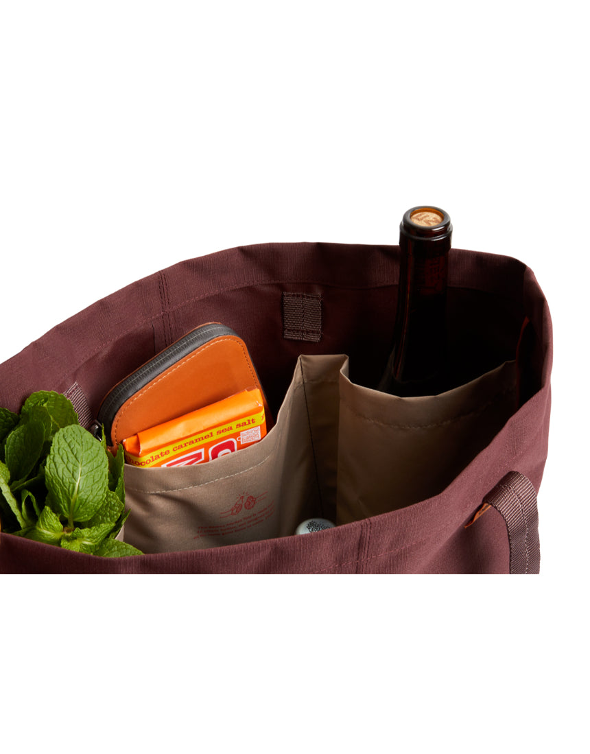 Bellroy Market Tote in Burgundy, a stylish and spacious leather tote bag with handles and a sleek design for everyday use.