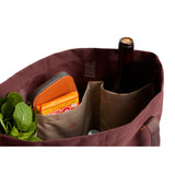 Bellroy Market Tote in Burgundy, a stylish and spacious leather tote bag with handles and a sleek design for everyday use.