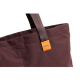 Bellroy Market Tote in Burgundy with spacious interior and sturdy handles, perfect for shopping and everyday use.