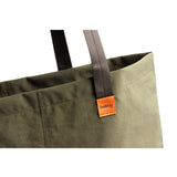 Bellroy Market Tote in Willow color, featuring durable fabric and spacious interior for carrying everyday essentials.