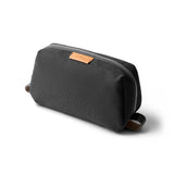 Bellroy Slate toiletry kit with multiple compartments, compact design, and durable material for travel organization.
