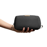 Bellroy Slate toiletry kit with zipper closure and multiple compartments for organizing grooming essentials.