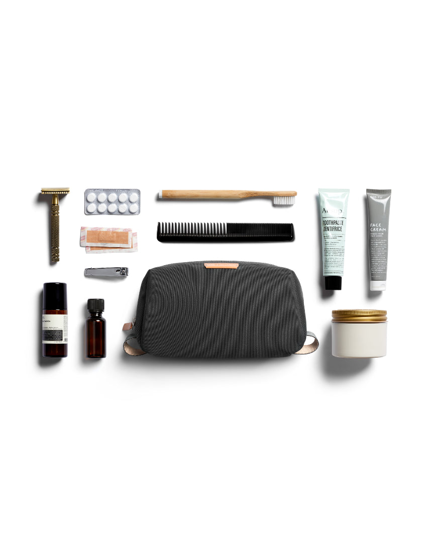 Bellroy Slate toiletry kit with zipper closure and multiple compartments for organizing grooming essentials.