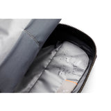 Bellroy black toiletry kit with multiple compartments and zipper closure, designed for organizing travel essentials.
