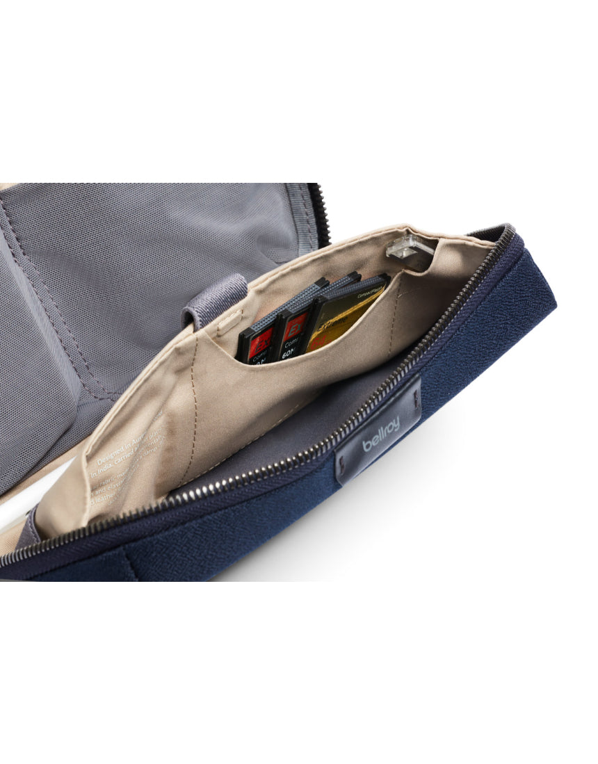 Bellroy Tech Kit in navy, compact organizer with multiple compartments for cables, chargers, and tech accessories.