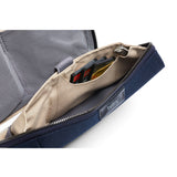 Bellroy Tech Kit in navy, compact organizer with multiple compartments for cables, chargers, and tech accessories.