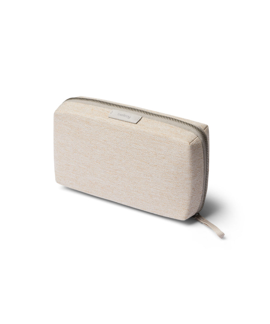 Bellroy Tech Kit Saltbush showing compact organizer with multiple compartments for cables and accessories.