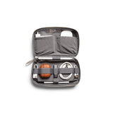 Bellroy Tech Kit Saltbush with multiple compartments for organizing cables, chargers, and accessories in a compact design.