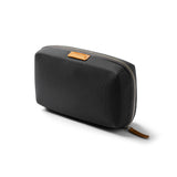 Bellroy Tech Kit in slate color with multiple compartments for accessories and cables, compact and stylish for travel.
