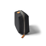 Bellroy Tech Kit in slate color, compact organizer with multiple compartments for cables and accessories, designed for travel and storage.
