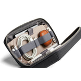 Bellroy Tech Kit in slate color with organized compartments for cables, chargers, and accessories, made from durable material.