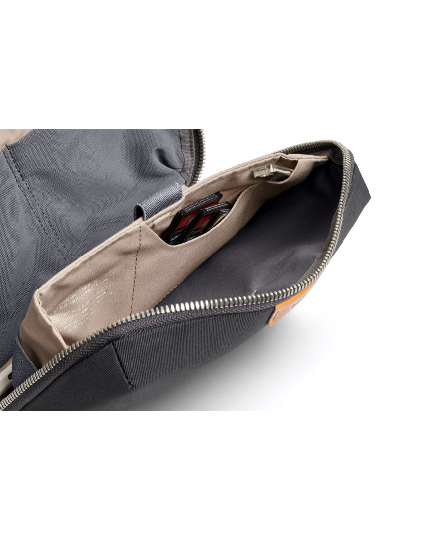 Bellroy Tech Kit in slate color, compact travel organizer with multiple compartments for cables and accessories.