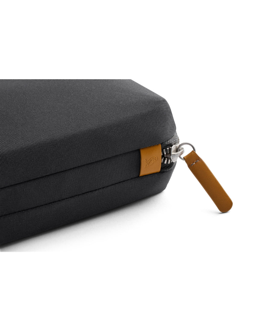 Bellroy Tech Kit in slate color, compact organizer with multiple compartments for cables, chargers, and tech accessories.
