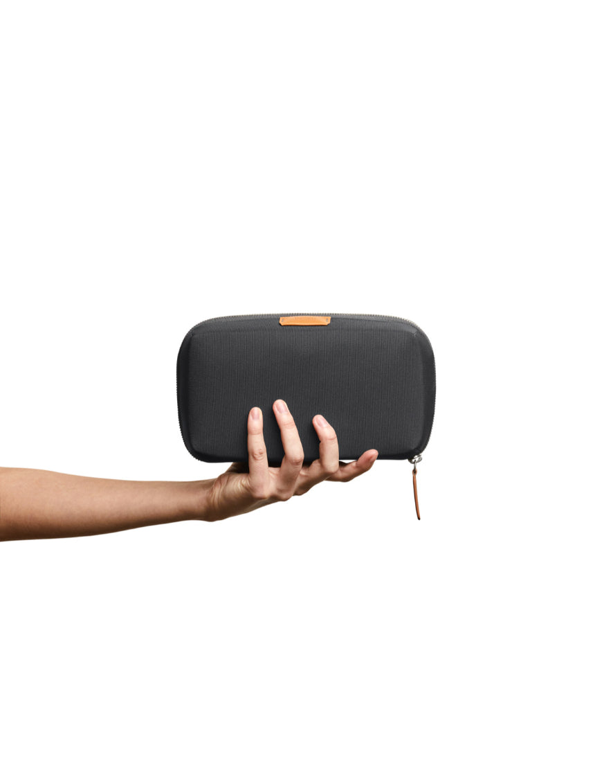 Bellroy Tech Kit in slate color, compact organizer with multiple compartments for cables, accessories, and tech essentials.