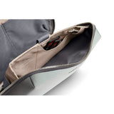 Bellroy Tech Kit in Eucalyptus with multiple compartments for organizing cables, chargers, and tech accessories.
