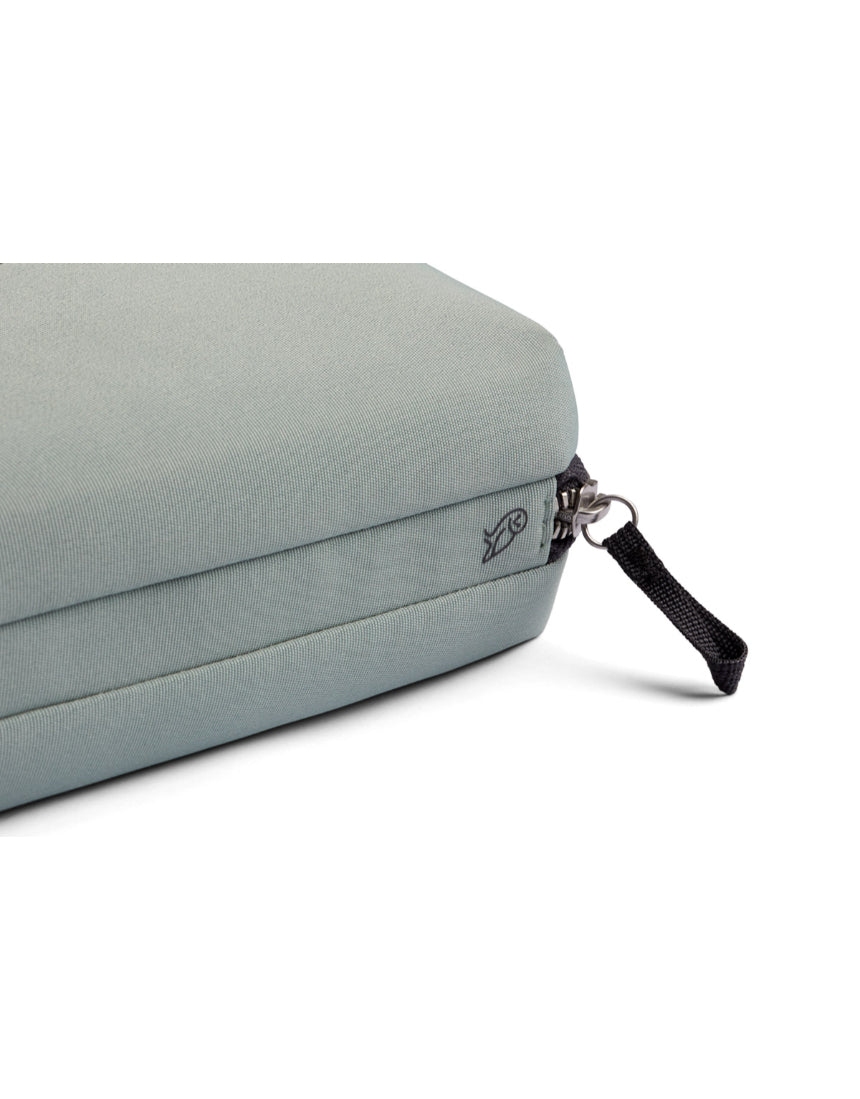 Bellroy Tech Kit in Eucalyptus with multiple compartments for organizing cables and accessories on a clean background.