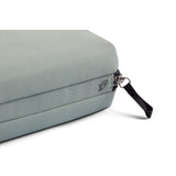 Bellroy Tech Kit in Eucalyptus with multiple compartments for organizing cables and accessories on a clean background.