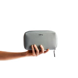Bellroy Tech Kit in Eucalyptus color, showing compact organizer with multiple compartments for cables and accessories.