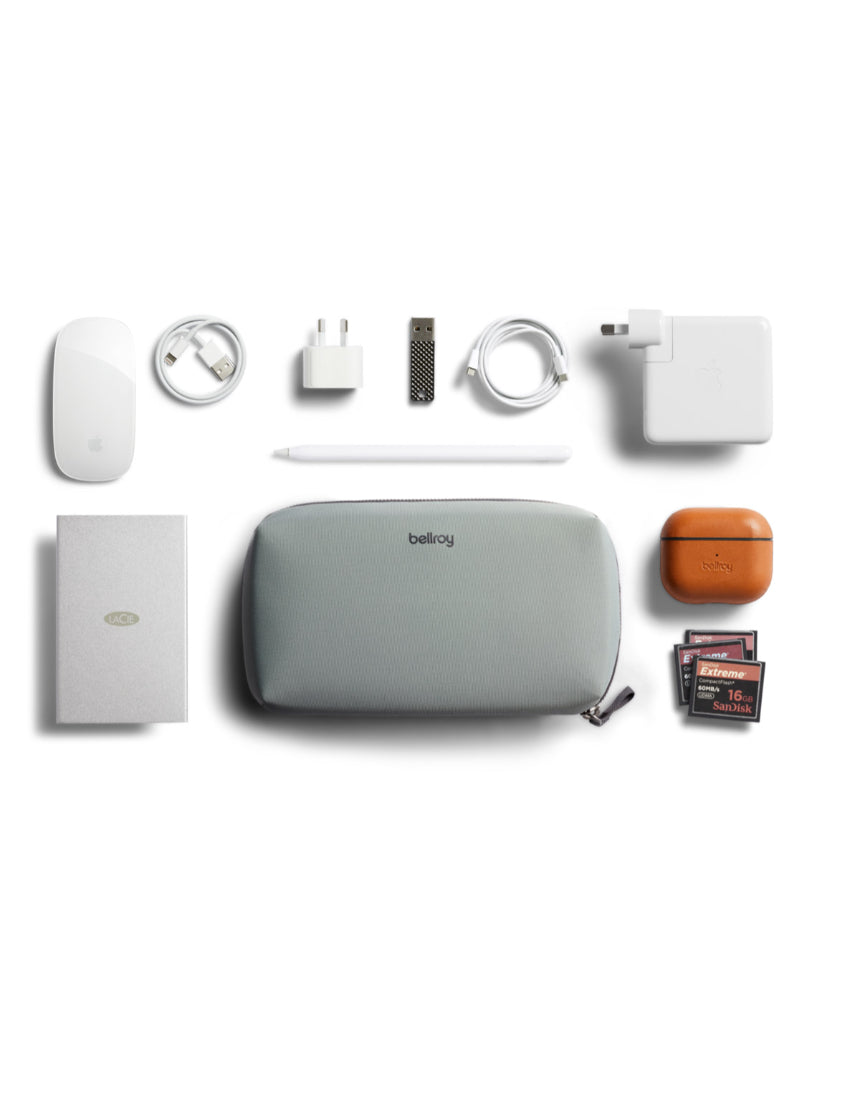 Bellroy Tech Kit in Eucalyptus with multiple compartments for organizing cables, chargers, and accessories.