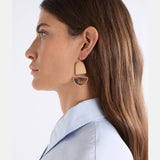 Elk Heran hook earrings in tortoiseshell with a curved design, featuring a sleek, modern style for everyday wear.