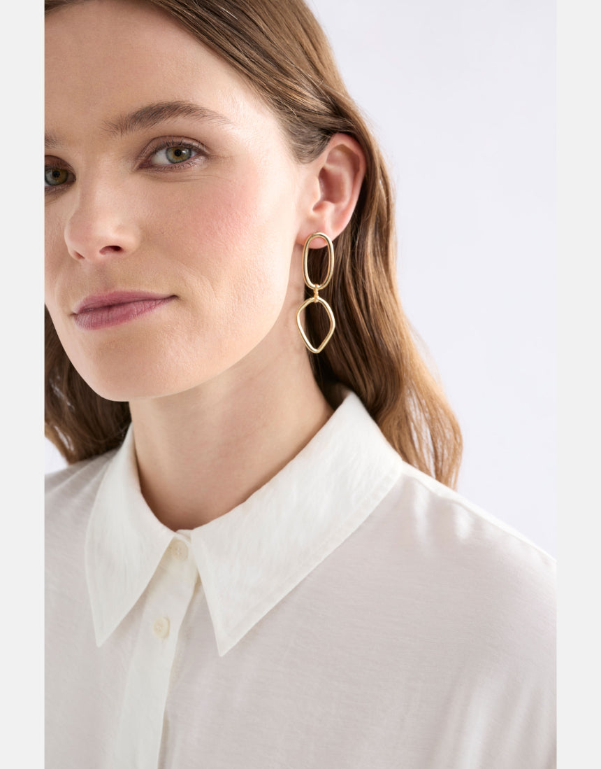 Elk Boden drop earrings in gold featuring sleek, modern design with a smooth, elongated shape and polished finish.