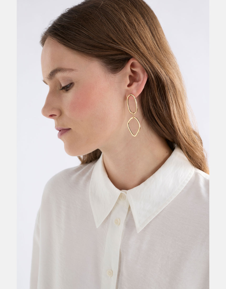 Gold Elk Boden Drop Earring showcasing a sleek, minimalist design with a smooth gold finish and elegant drop style.