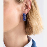Elk Karan small hoop earrings in denim with a textured metal finish, featuring a simple circular hoop design.