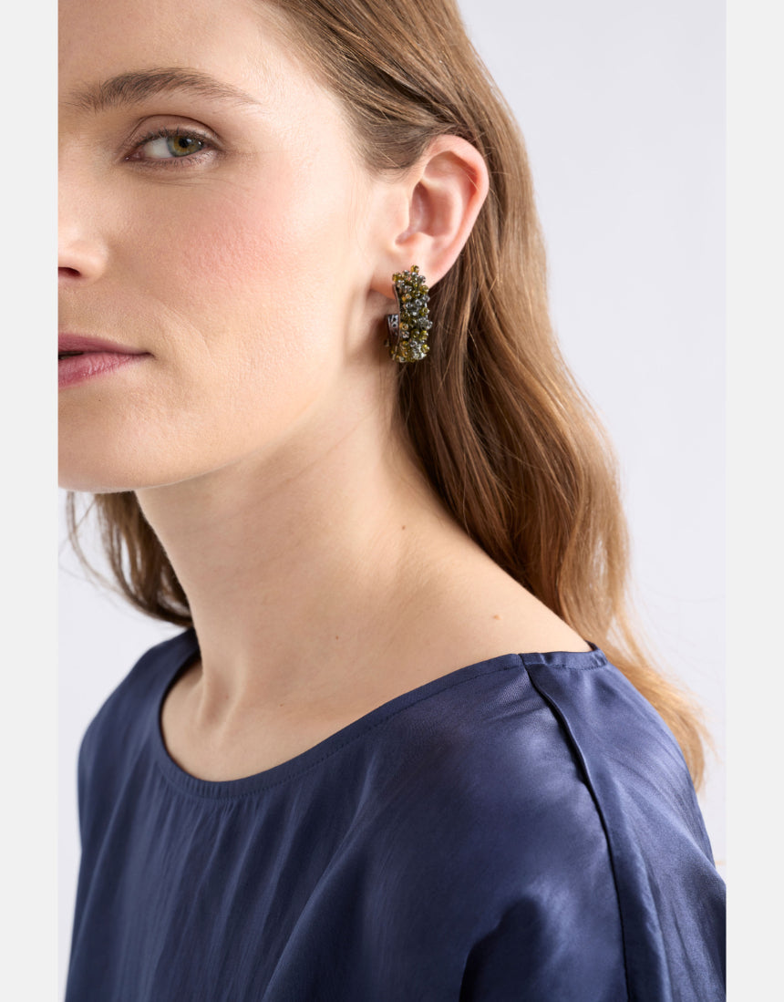 Elk Karan Small Hoop Earring in olive green with a minimalist hoop design, showcasing a sleek and modern jewelry style.