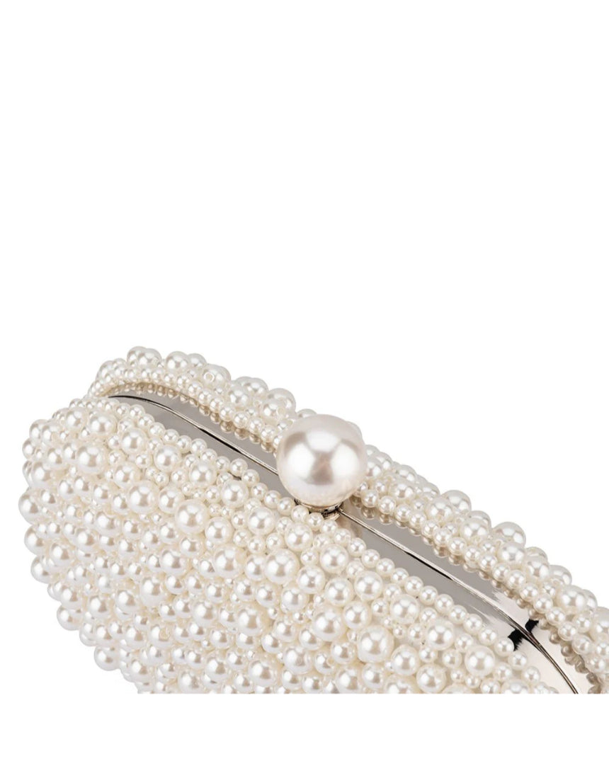 Olga Berg Valentina Pearl Clutch bag with a glossy pearl finish and elegant gold clasp, perfect for evening occasions.