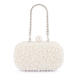 Olga Berg Valentina Pearl Clutch bag with a glossy pearl finish, elegant and compact for evening occasions.
