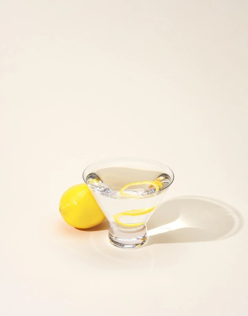 Set of two Viski heavy base crystal martini glasses with elegant design, perfect for stylish cocktail presentation.