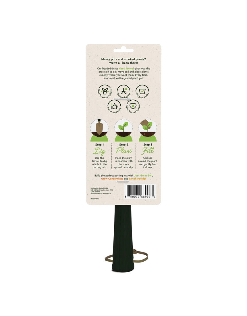 Green We The Wild hand trowel, a garden tool with a sturdy metal blade and ergonomic handle for planting and gardening tasks.