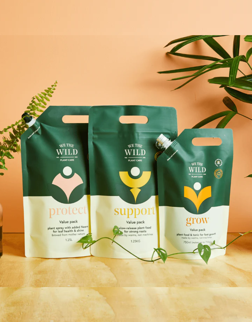 We The Wild Essential Trio plant pack featuring three healthy, vibrant plants in eco-friendly containers.